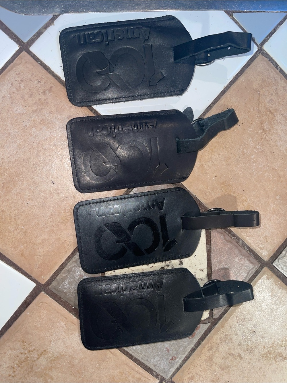 AMERICAN AIRLINES 100 yr anniversary Black Embossed Leather Luggage Tags